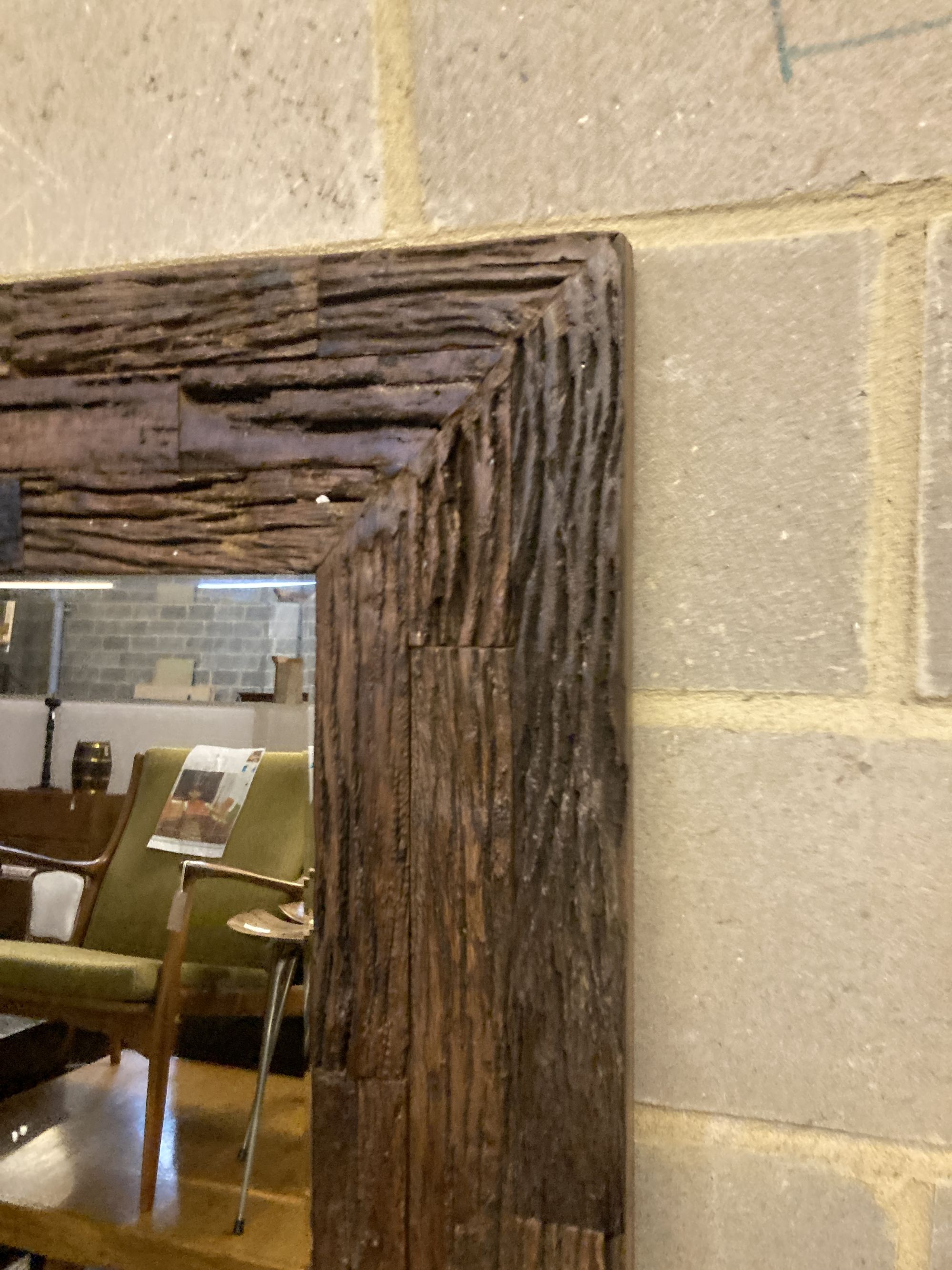 A large rectangular reclaimed wood wall mirror, width 122cm, depth 184cm